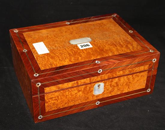 A burr walnut and mother of pearl inlaid sewing box